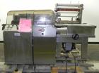 Used Weldotron 5962 Stainless Steel Automatic L-bar Sealer capable of speeds up to 25 packages per minute. Has an 18