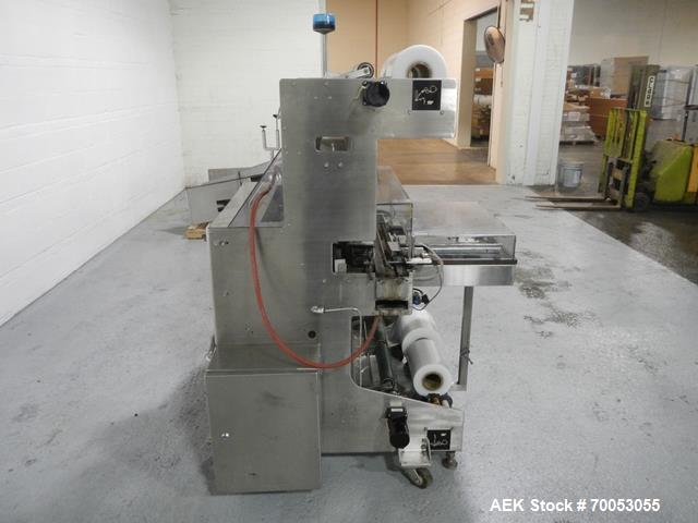 Used-One (1) used Omega dual lane shrink bundler, model DL-27, speeds up to 240 containers/minute, approximately 27" wide se...