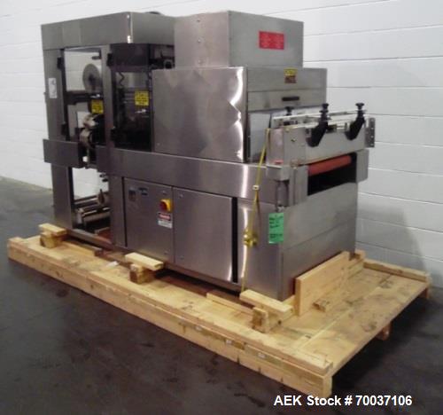 Used API Stainless Steel Pharmaceutical Shrink Bundler, Model Duratech 2000 S-PH. Integrated heat tunnel. Capable of up to 100 round or rectangular shaped containers depending on pattern and size. Si...