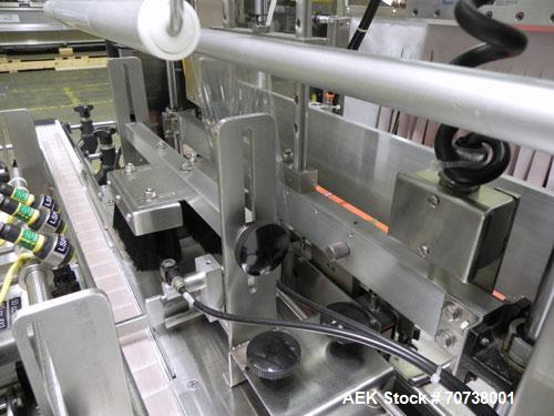 Used API Model DuraTech 2000-S-PH Pharmaceutical Shrink Bundler. Machine is capable of speeds up to 100 bottles/packages per minute (depending on pattern and size). Can handle containers up to 8" (he...