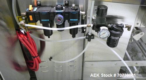 Used API Model DuraTech 2000-S-PH Pharmaceutical Shrink Bundler. Machine is capable of speeds up to 100 bottles/packages per minute (depending on pattern and size). Can handle containers up to 8" (he...
