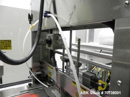 Used API Model DuraTech 2000-S-PH Pharmaceutical Shrink Bundler. Machine is capable of speeds up to 100 bottles/packages per minute (depending on pattern and size). Can handle containers up to 8" (he...
