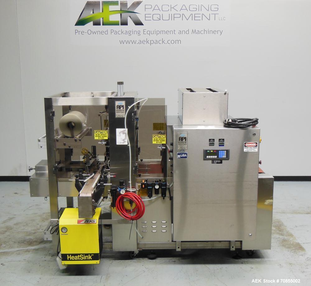 Used API Model DuraTech 2000-S-PH Pharmaceutical Shrink Bundler. Machine is capable of speeds up to 100 bottles/packages per minute (depending on pattern and size). Can handle containers up to 8" (he...