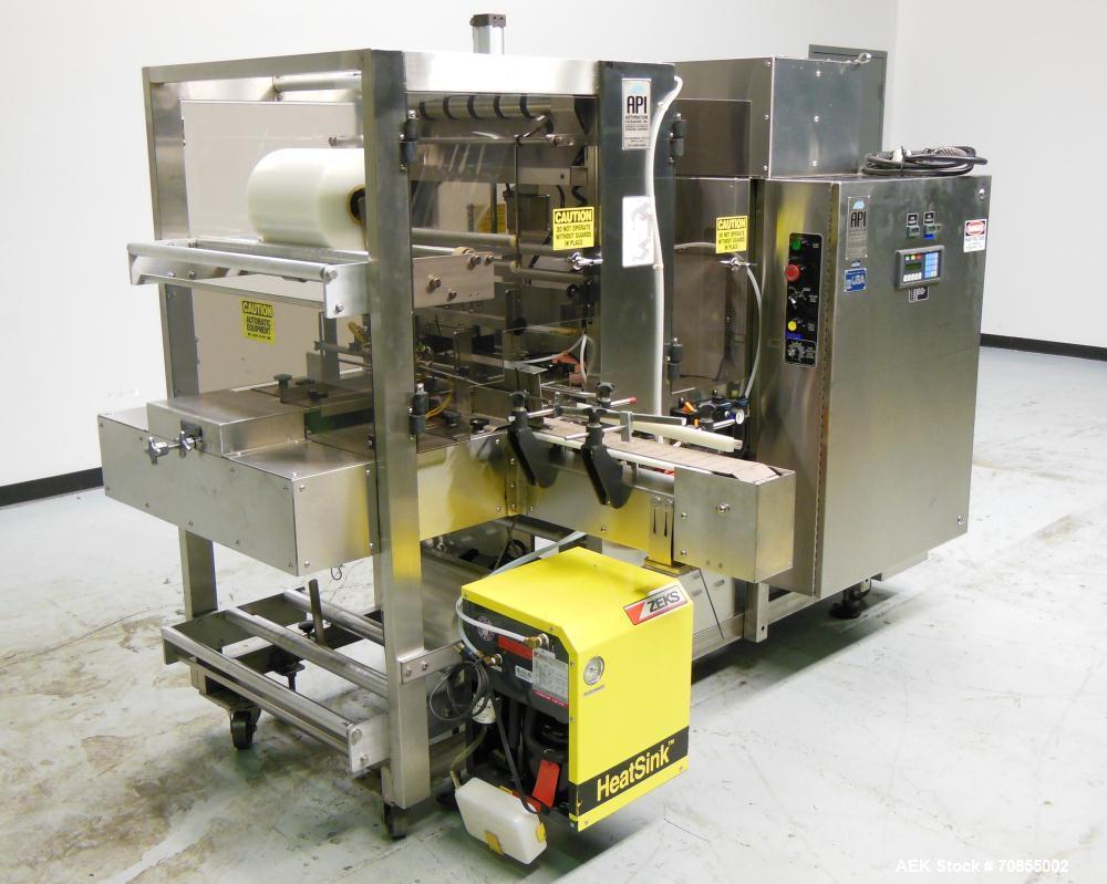 Used API Model DuraTech 2000-S-PH Pharmaceutical Shrink Bundler. Machine is capable of speeds up to 100 bottles/packages per minute (depending on pattern and size). Can handle containers up to 8" (he...