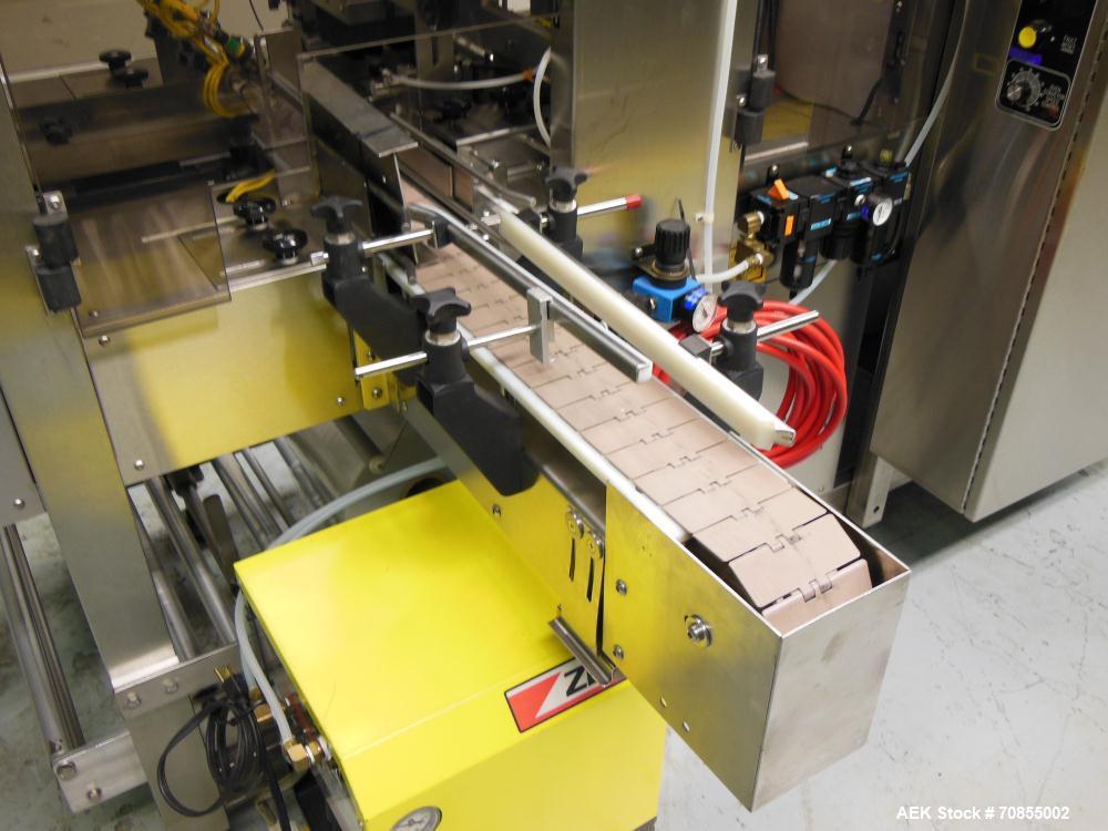 Used API Model DuraTech 2000-S-PH Pharmaceutical Shrink Bundler. Machine is capable of speeds up to 100 bottles/packages per minute (depending on pattern and size). Can handle containers up to 8" (he...