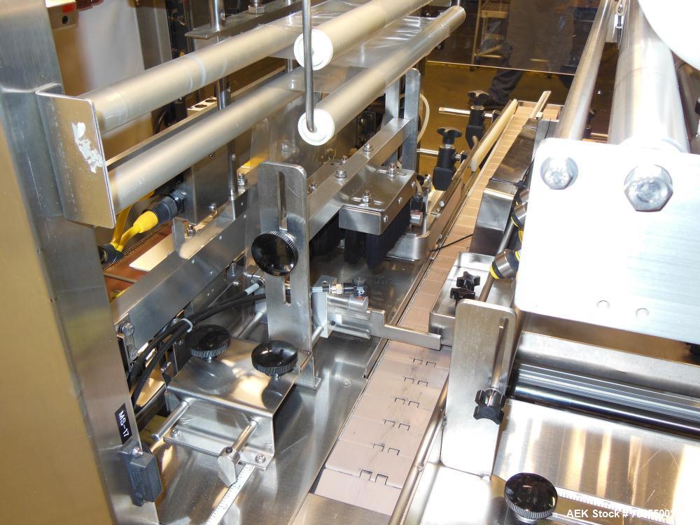 Used API Model DuraTech 2000-S-PH Pharmaceutical Shrink Bundler. Machine is capable of speeds up to 100 bottles/packages per minute (depending on pattern and size). Can handle containers up to 8" (he...