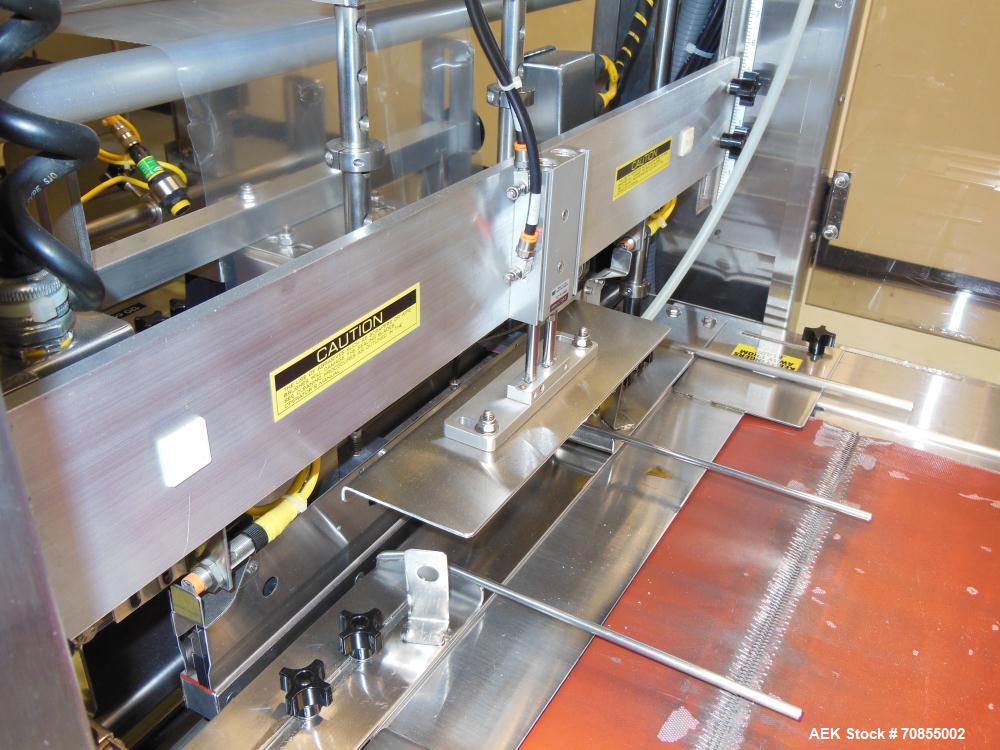 Used API Model DuraTech 2000-S-PH Pharmaceutical Shrink Bundler. Machine is capable of speeds up to 100 bottles/packages per minute (depending on pattern and size). Can handle containers up to 8" (he...