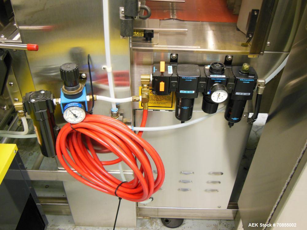 Used API Model DuraTech 2000-S-PH Pharmaceutical Shrink Bundler. Machine is capable of speeds up to 100 bottles/packages per minute (depending on pattern and size). Can handle containers up to 8" (he...