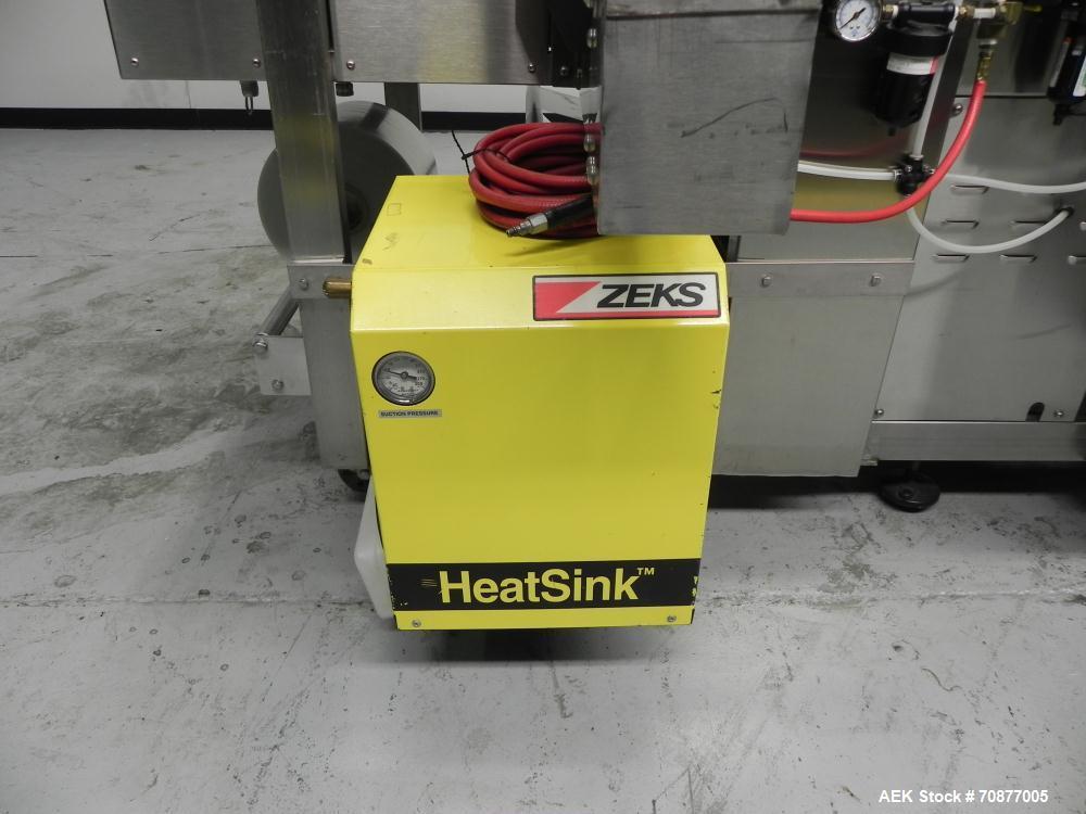 Used API (Lantech) Model DuraTech 2000-S-PH Pharmaceutical Shrink Bundler. Machine is capable of speeds up to 100 bottles/packages per minute (depending on pattern and size). Can handle containers up...
