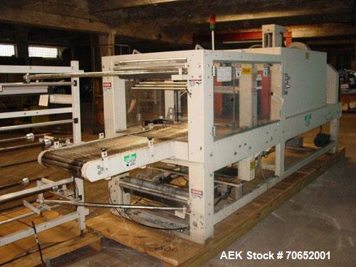 Used Arpac Model 105TW28 Shrink Wrapper with Film Feed Rack and Splicer. Speed up to 36 Wraps per Minute. 6' L x 20" W Roller Flight Infeed Conveyor with Pacing Gate. 28" Wide seal bar. Capable of ru...