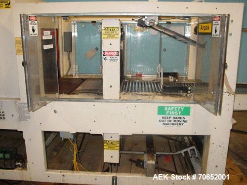 Used Arpac Model 105TW28 Shrink Wrapper with Film Feed Rack and Splicer. Speed up to 36 Wraps per Minute. 6' L x 20" W Roller Flight Infeed Conveyor with Pacing Gate. 28" Wide seal bar. Capable of ru...