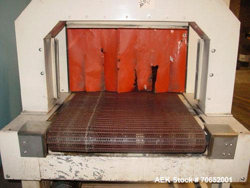 Used Arpac Model 105TW28 Shrink Wrapper with Film Feed Rack and Splicer. Speed up to 36 Wraps per Minute. 6' L x 20" W Roller Flight Infeed Conveyor with Pacing Gate. 28" Wide seal bar. Capable of ru...