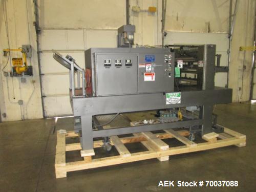 Used- Arpac, Model 55-28 Shrink Bundler with Heat Tunnel. Dual rolls with top and bottom film loading. 28" x 14" size range....