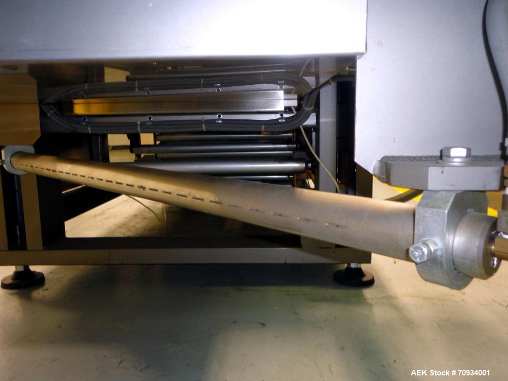 Used Arpac Brandpac Model BPMP-5342 Automatic Single Roll Shrink Bundler, for Print Registered Film.  Capable of Unsupported Multipack Shrink Bundling or Tray Product Shrink Bundling. OEM rated speed...