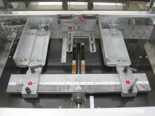Used Omega Design DL-27 Dual Lane Shrink Bundler. Capable of speeds up to 240 BPM. Maximum product height 11". Maximum film width 26". 3/60/208/240V. Includes Omega shrink tunnel. Last used in solid ...