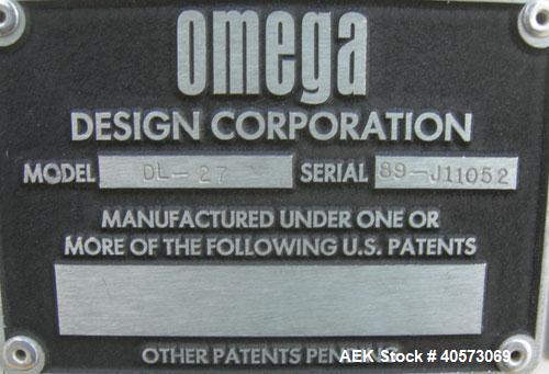 Used Omega Design DL-27 Dual Lane Shrink Bundler. Capable of speeds up to 240 BPM. Maximum product height 11". Maximum film width 26". 3/60/208/240V. Includes Omega shrink tunnel. Last used in solid ...