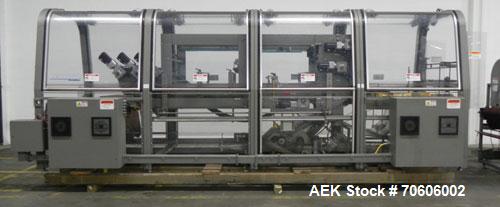 Used Douglas Contour Model M-75 Multi-Pack Shrink Bundler capable of speeds up to 75 cycles per minute. Now configured for print registered film, unsupported 8 oz and 11 oz bottles in multiple lanes,...
