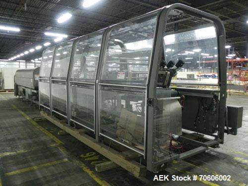 Used Douglas Contour Model M-75 Multi-Pack Shrink Bundler capable of speeds up to 75 cycles per minute. Now configured for print registered film, unsupported 8 oz and 11 oz bottles in multiple lanes,...