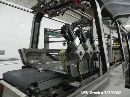 Used Douglas Contour Model M-75 Multi-Pack Shrink Bundler capable of speeds up to 75 cycles per minute. Now configured for print registered film, unsupported 8 oz and 11 oz bottles in multiple lanes,...