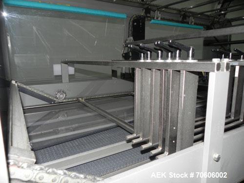 Used Douglas Contour Model M-75 Multi-Pack Shrink Bundler capable of speeds up to 75 cycles per minute. Now configured for print registered film, unsupported 8 oz and 11 oz bottles in multiple lanes,...