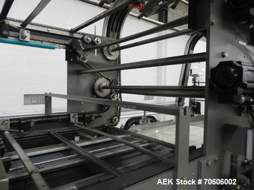 Used Douglas Contour Model M-75 Multi-Pack Shrink Bundler capable of speeds up to 75 cycles per minute. Now configured for print registered film, unsupported 8 oz and 11 oz bottles in multiple lanes,...