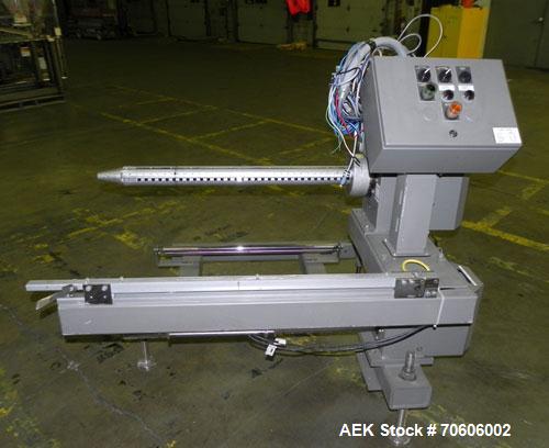 Used Douglas Contour Model M-75 Multi-Pack Shrink Bundler capable of speeds up to 75 cycles per minute. Now configured for print registered film, unsupported 8 oz and 11 oz bottles in multiple lanes,...