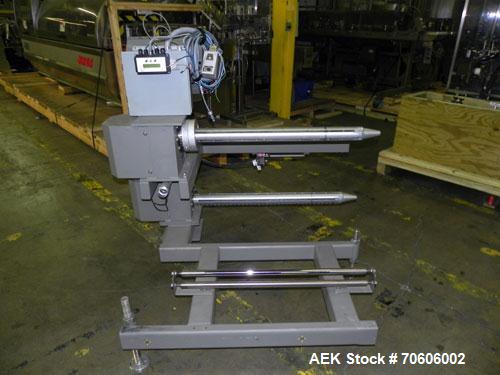 Used Douglas Contour Model M-75 Multi-Pack Shrink Bundler capable of speeds up to 75 cycles per minute. Now configured for print registered film, unsupported 8 oz and 11 oz bottles in multiple lanes,...