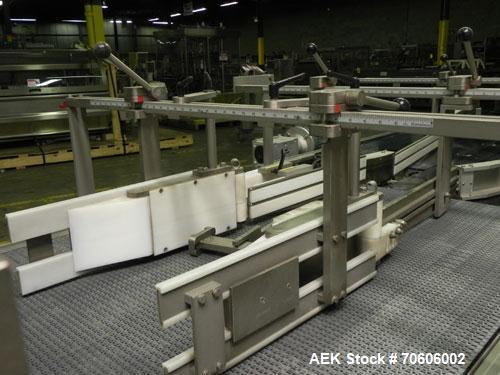 Used Douglas Contour Model M-75 Multi-Pack Shrink Bundler capable of speeds up to 75 cycles per minute. Now configured for print registered film, unsupported 8 oz and 11 oz bottles in multiple lanes,...