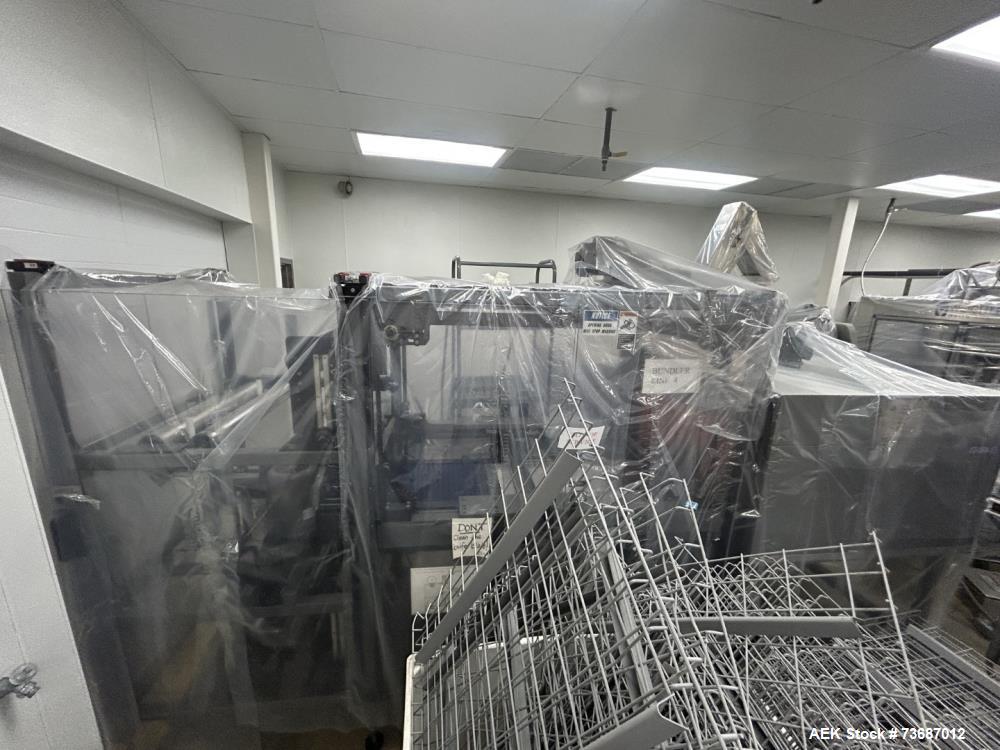 Used EDL Model Side Feed Automatic Stainless Steel Shrink Bundler with Integrated Heat Shrink Tunnel.