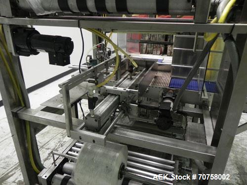 Used Great Lakes Model 708 E-27 Shrink Bundler capable of speeds up to 15 bundles per minute (depending on container size and pack pattern). Will handle bundles up to 12" high x 13" deep. Has a 27" w...