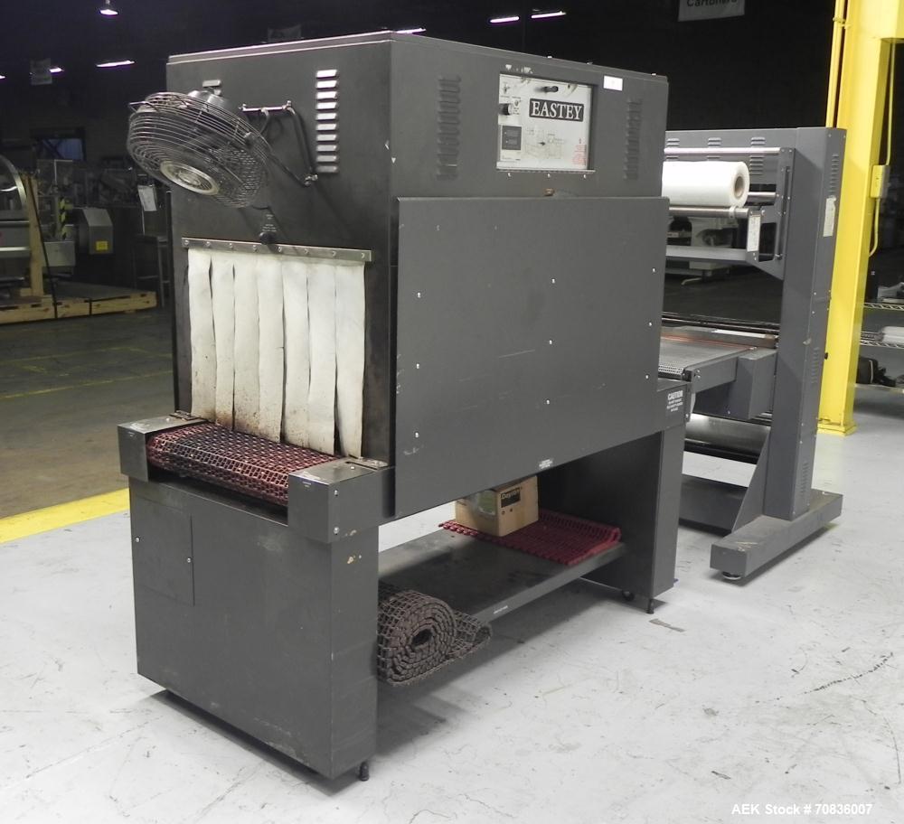 Used Heat Seal Model SW 2414 Semi-Automatic Shrink Bundler & Eastey Model ET 2420 Shrink Tunnel. Bundler has top and bottom power-assisted film unwind. Has 24" (wide) seal jaw with a 14" (tall) openi...