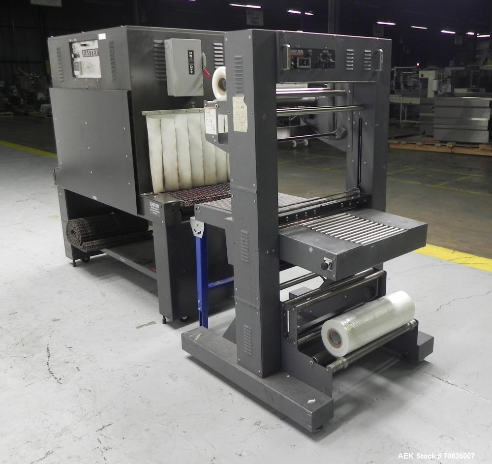 Used Heat Seal Model SW 2414 Semi-Automatic Shrink Bundler & Eastey Model ET 2420 Shrink Tunnel. Bundler has top and bottom power-assisted film unwind. Has 24" (wide) seal jaw with a 14" (tall) openi...
