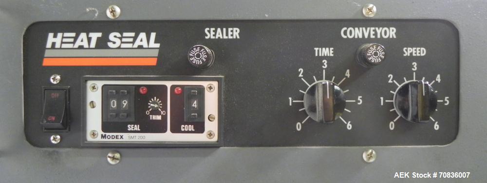 Used Heat Seal Model SW 2414 Semi-Automatic Shrink Bundler & Eastey Model ET 2420 Shrink Tunnel. Bundler has top and bottom power-assisted film unwind. Has 24" (wide) seal jaw with a 14" (tall) openi...
