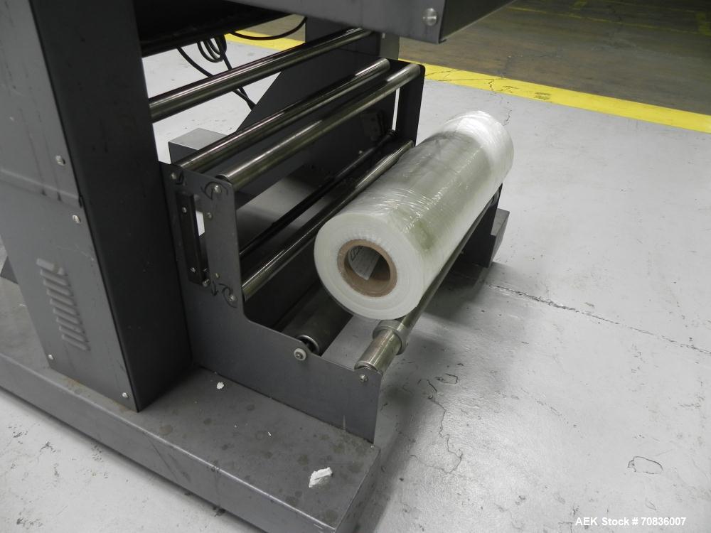 Used Heat Seal Model SW 2414 Semi-Automatic Shrink Bundler & Eastey Model ET 2420 Shrink Tunnel. Bundler has top and bottom power-assisted film unwind. Has 24" (wide) seal jaw with a 14" (tall) openi...