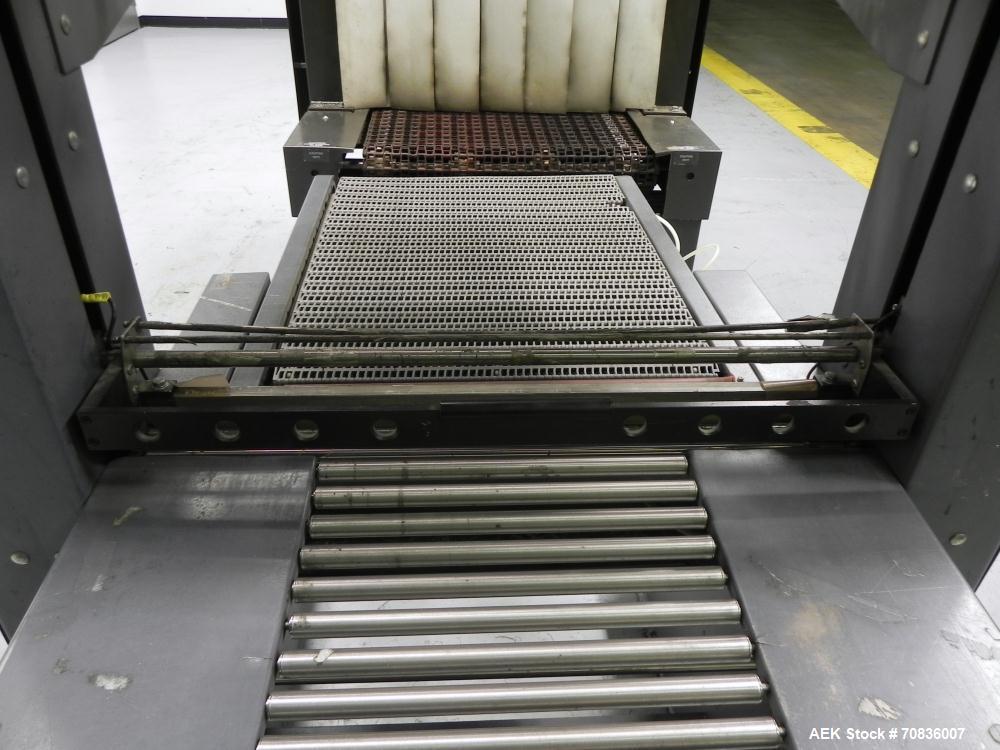 Used Heat Seal Model SW 2414 Semi-Automatic Shrink Bundler & Eastey Model ET 2420 Shrink Tunnel. Bundler has top and bottom power-assisted film unwind. Has 24" (wide) seal jaw with a 14" (tall) openi...