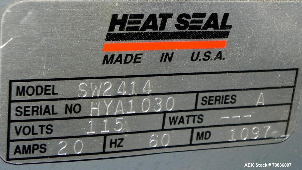 Used Heat Seal Model SW 2414 Semi-Automatic Shrink Bundler & Eastey Model ET 2420 Shrink Tunnel. Bundler has top and bottom power-assisted film unwind. Has 24" (wide) seal jaw with a 14" (tall) openi...