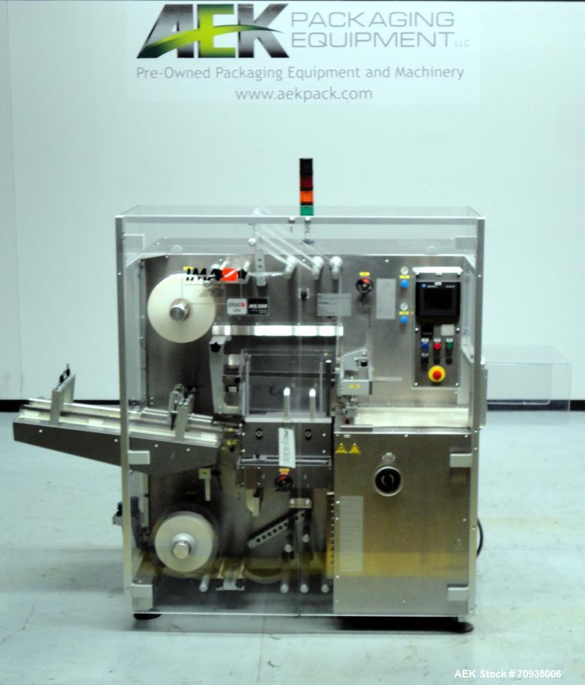 Used IMA BFB MS300 Shrink Bundler or stretch banding machine for carton multi-packing. Capable of speeds up to 40 bundles per minute. Uses PE type films. Max film speed to 150' per minute. Inline and...