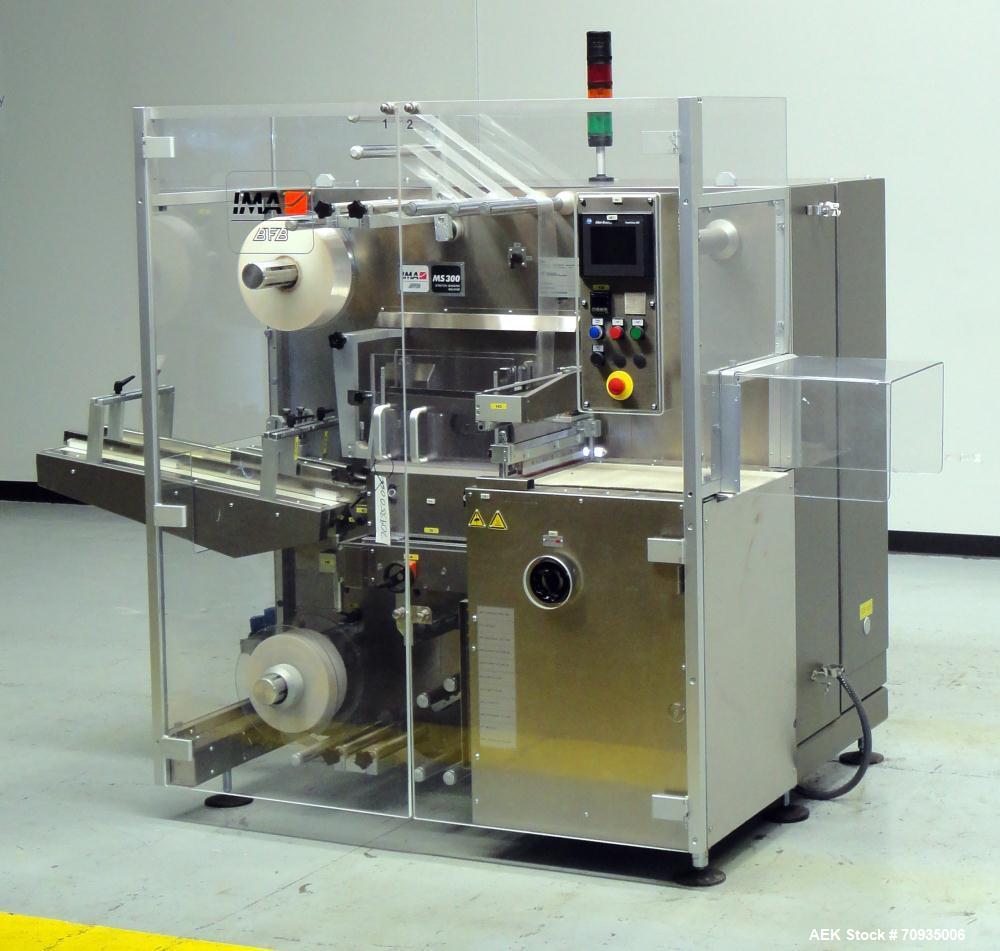 Used IMA BFB MS300 Shrink Bundler or stretch banding machine for carton multi-packing. Capable of speeds up to 40 bundles per minute. Uses PE type films. Max film speed to 150' per minute. Inline and...
