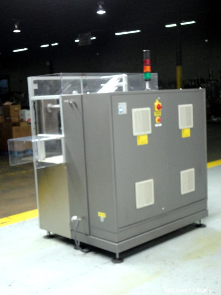 Used IMA BFB MS300 Shrink Bundler or stretch banding machine for carton multi-packing. Capable of speeds up to 40 bundles per minute. Uses PE type films. Max film speed to 150' per minute. Inline and...