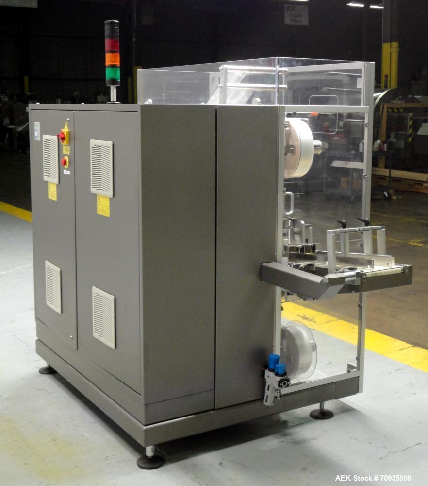 Used IMA BFB MS300 Shrink Bundler or stretch banding machine for carton multi-packing. Capable of speeds up to 40 bundles per minute. Uses PE type films. Max film speed to 150' per minute. Inline and...
