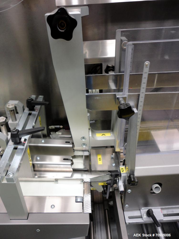 Used IMA BFB MS300 Shrink Bundler or stretch banding machine for carton multi-packing. Capable of speeds up to 40 bundles per minute. Uses PE type films. Max film speed to 150' per minute. Inline and...