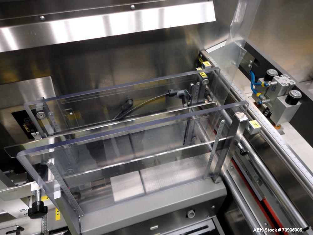 Used IMA BFB MS300 Shrink Bundler or stretch banding machine for carton multi-packing. Capable of speeds up to 40 bundles per minute. Uses PE type films. Max film speed to 150' per minute. Inline and...