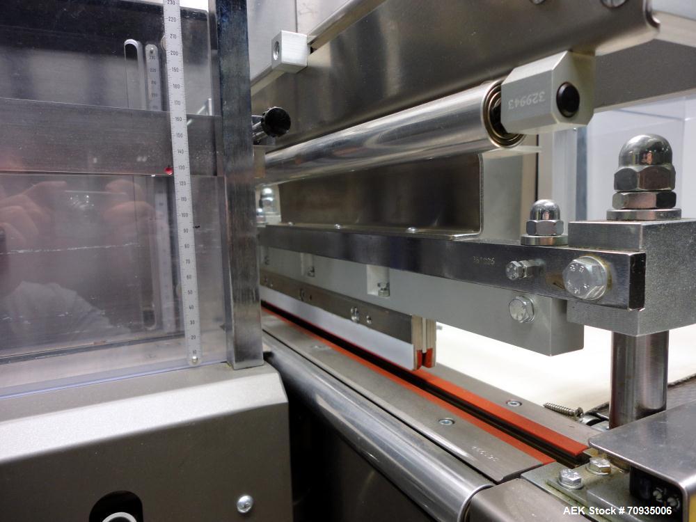 Used IMA BFB MS300 Shrink Bundler or stretch banding machine for carton multi-packing. Capable of speeds up to 40 bundles per minute. Uses PE type films. Max film speed to 150' per minute. Inline and...
