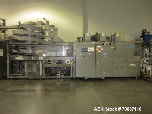Used KHS Kisters, Model 601P Tray Shrink Wrap Bundler for printed film with 24 in. x 10 ft. x 15 in. High Shrink Tunnel. Has Allen-Bradley Logix 5555 PLC and Panelview 550 touch screen controls. Elec...