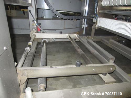 Used KHS Kisters, Model 601P Tray Shrink Wrap Bundler for printed film with 24 in. x 10 ft. x 15 in. High Shrink Tunnel. Has Allen-Bradley Logix 5555 PLC and Panelview 550 touch screen controls. Elec...