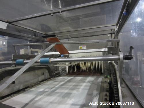 Used KHS Kisters, Model 601P Tray Shrink Wrap Bundler for printed film with 24 in. x 10 ft. x 15 in. High Shrink Tunnel. Has Allen-Bradley Logix 5555 PLC and Panelview 550 touch screen controls. Elec...