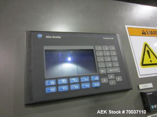 Used KHS Kisters, Model 601P Tray Shrink Wrap Bundler for printed film with 24 in. x 10 ft. x 15 in. High Shrink Tunnel. Has Allen-Bradley Logix 5555 PLC and Panelview 550 touch screen controls. Elec...