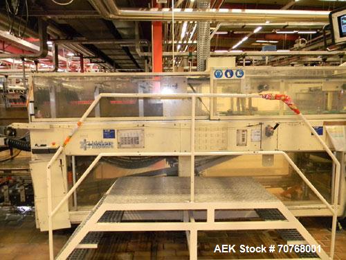 Used-Kisters 198/60 DZ Shrink Wrapper including infeed, outlet conveyors and magazine for carton pads.  For PET bottles 17, ...