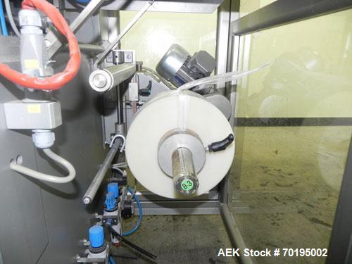 Used Multipack Model F-40 Carton Multi-Pack Stretch Or Shrink Film Bundler. Bundled package size range of Length- 30mm-350mm, Width- 12mm -200.., Height- 50mm -300. Cartons are received on infeed bel...