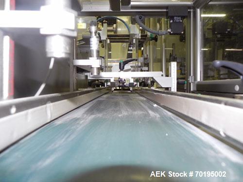 Used Multipack Model F-40 Carton Multi-Pack Stretch Or Shrink Film Bundler. Bundled package size range of Length- 30mm-350mm, Width- 12mm -200.., Height- 50mm -300. Cartons are received on infeed bel...